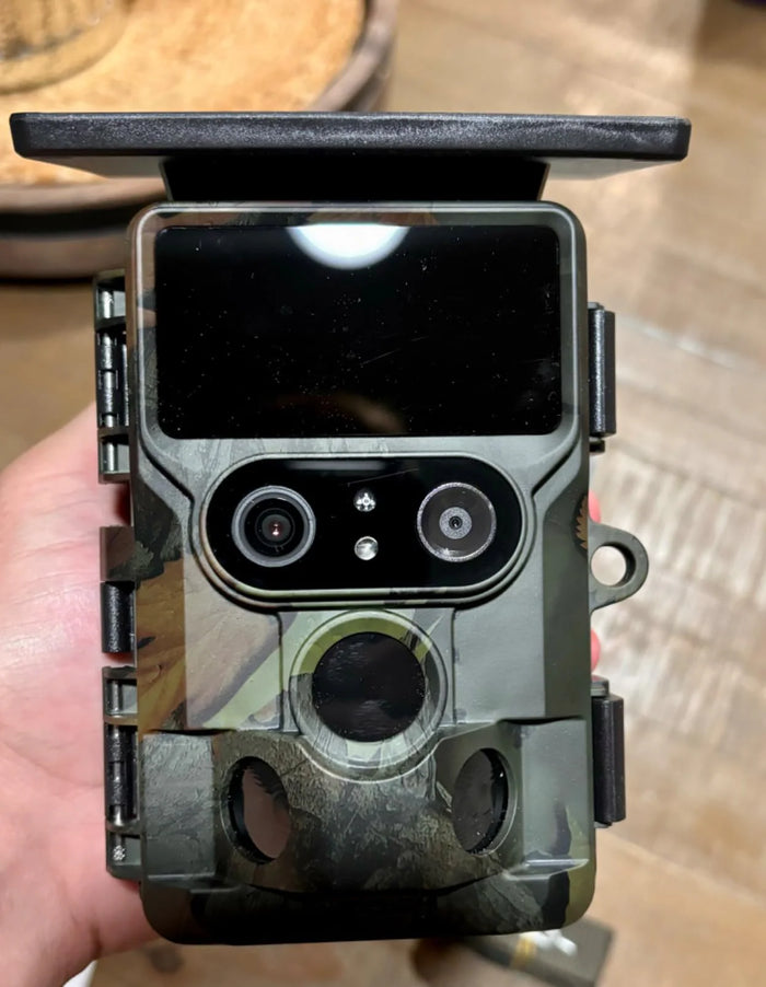 Campark TC22 4K Trail Camera in hand.